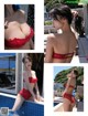 A woman in a red lingerie sitting in a pool.